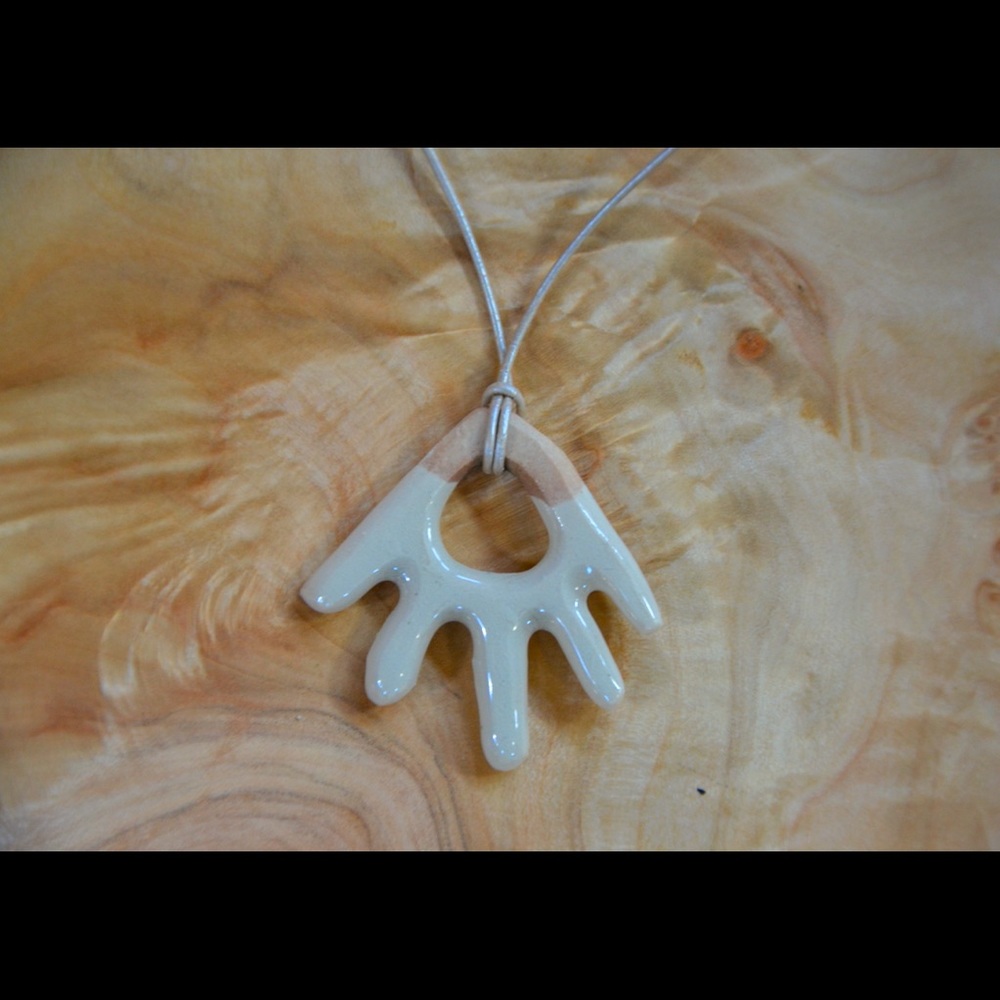 Handmade ceramic necklace on leather cord, magnetic clasp